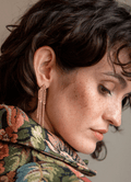 side profile of a lady wearing Judith Benita Tapestry Maxi Earrings