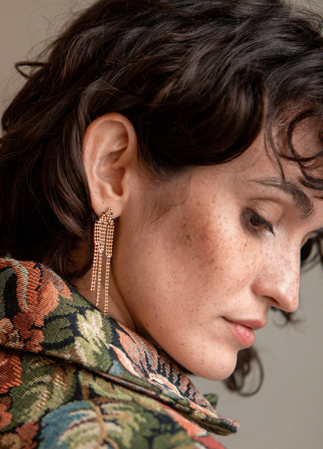 side profile of a lady wearing Judith Benita Tapestry Maxi Earrings