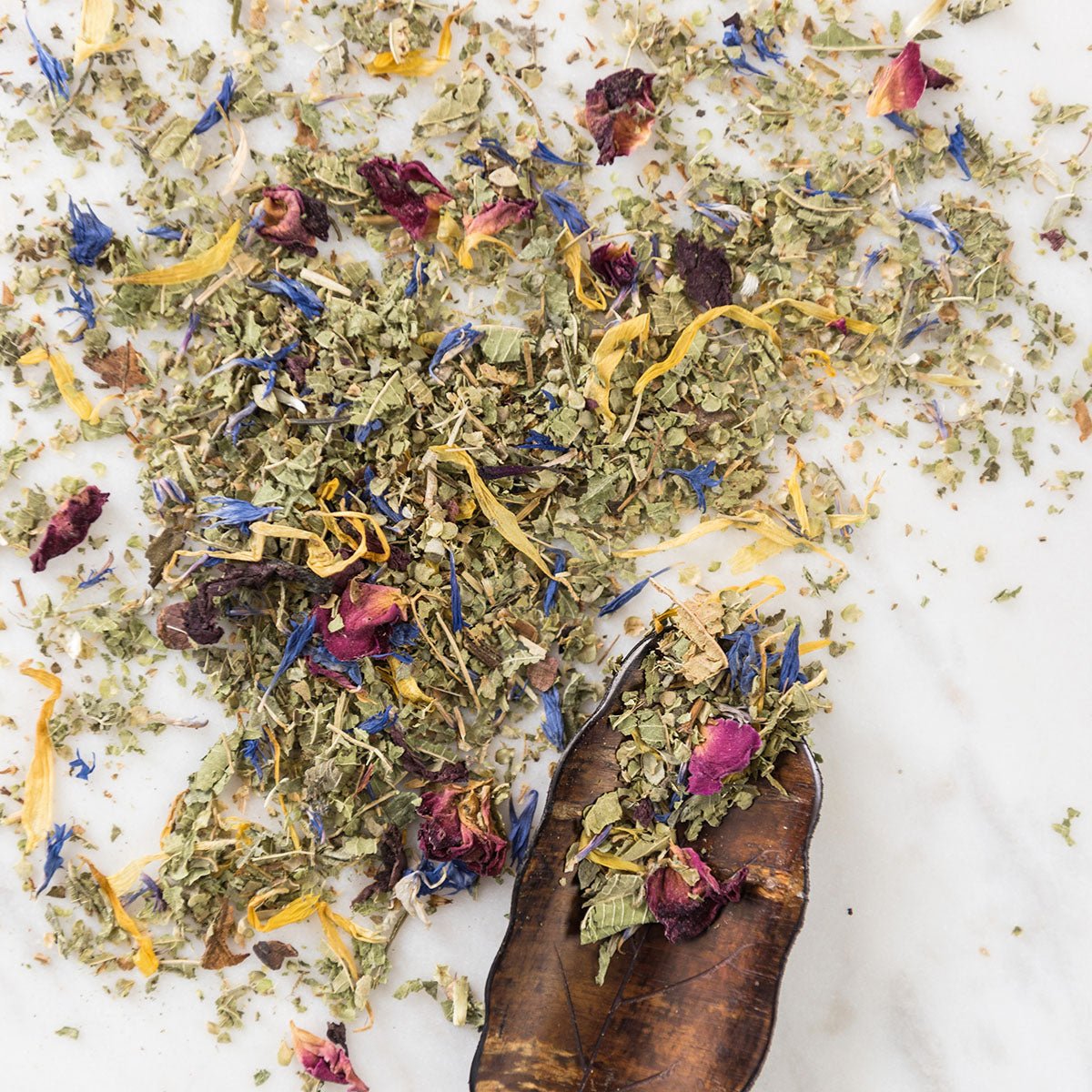 scattered tea leaves and flowers